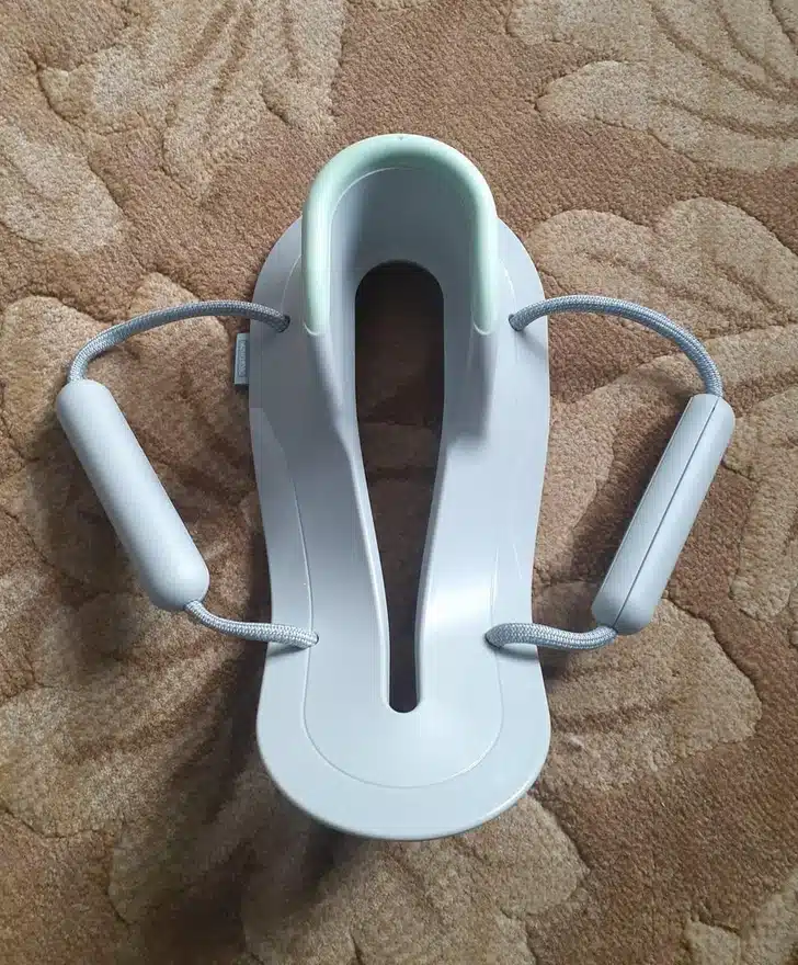 Objet plastique blanc aux formes arrondies