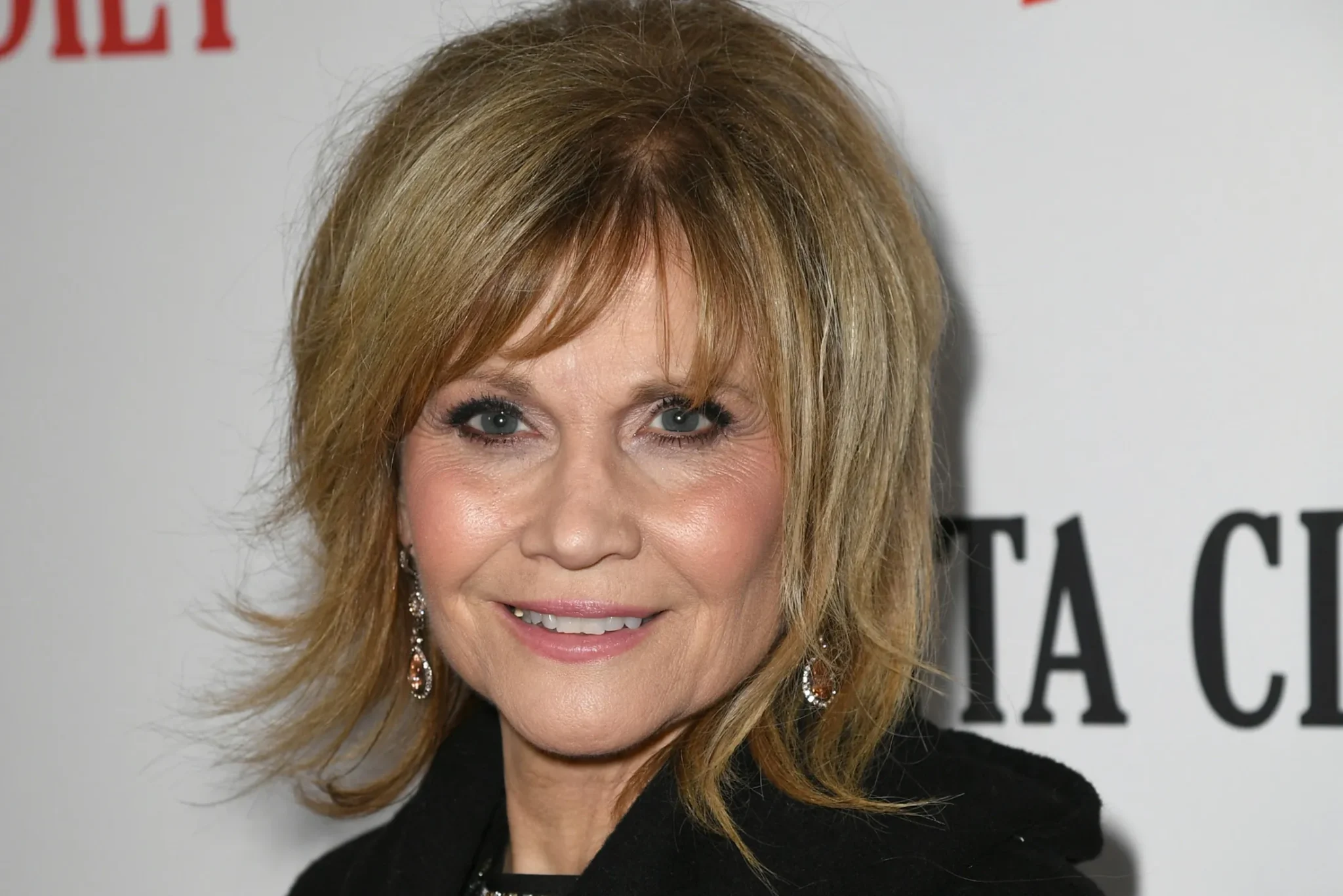 Markie Post en famille, souriante