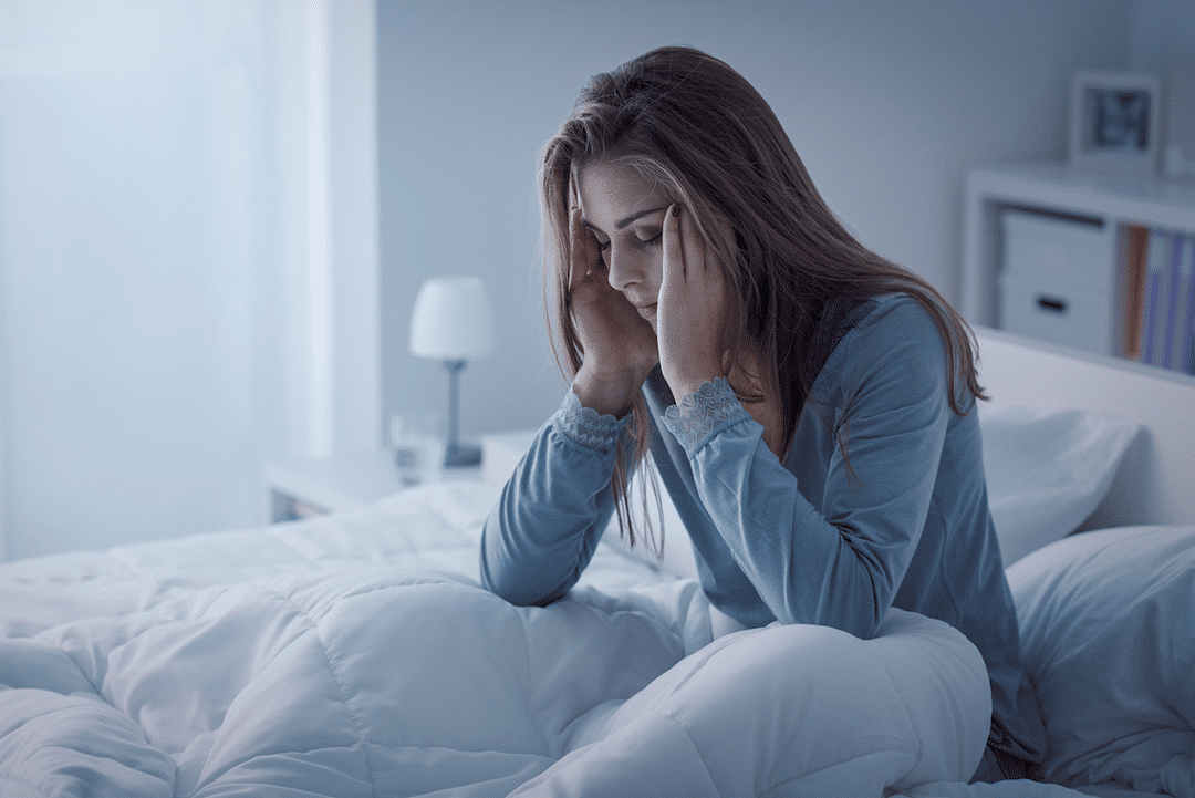Personne stressée au lit