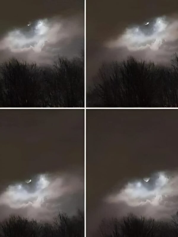 Photo d'un ciel nuageux où une forme lumineuse évoque une silhouette humaine