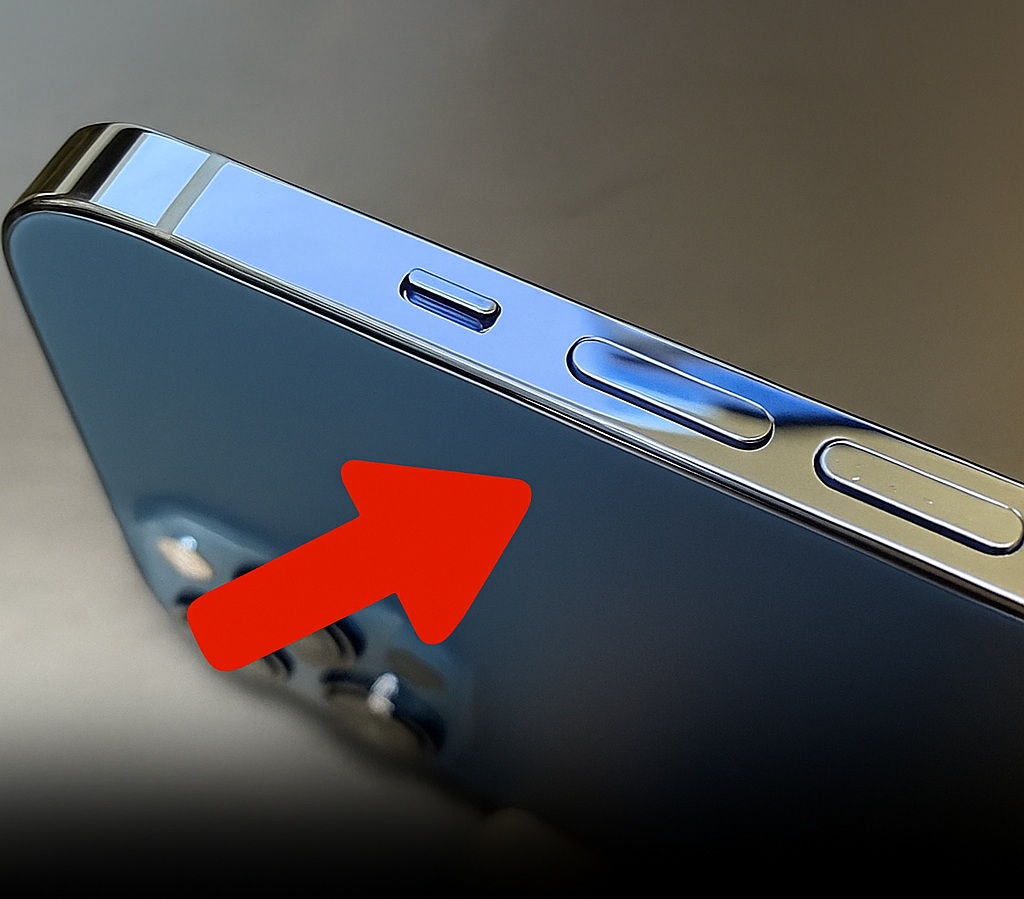 Personne utilisant le bouton de volume pour prendre une photo