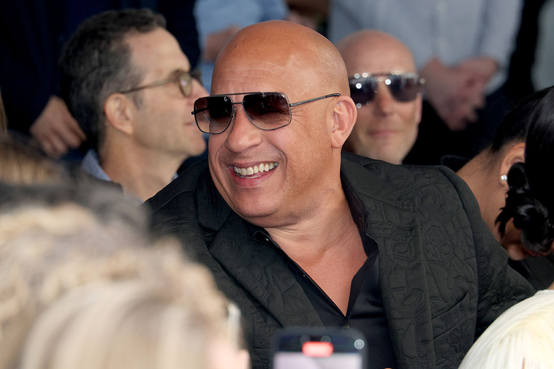 Vin Diesel souriant lors d'une cérémonie à Hollywood