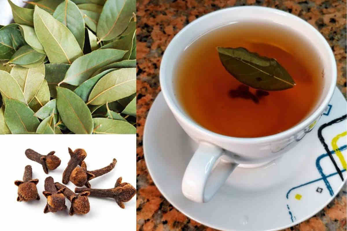 Tasse d'infusion laurier-girofle posée sur une table en bois