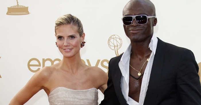 Heidi Klum et Seal lors d'un événement public, souriants.