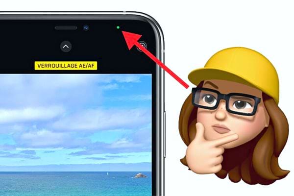 Un memoji avec un petit point vert sur écran iPhone 