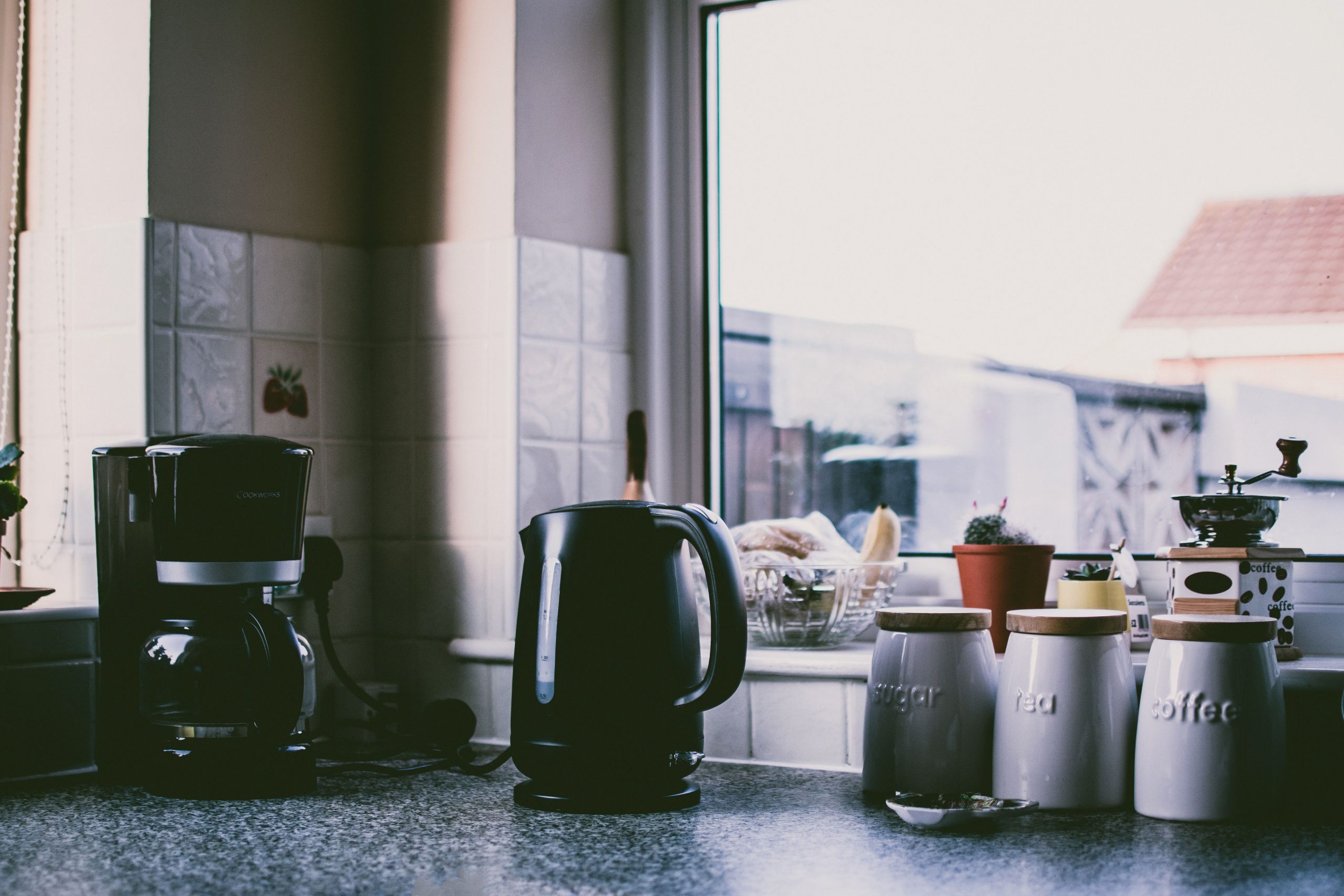 Photograph of a Kitchen Counter with Coffee Maker and Kettle