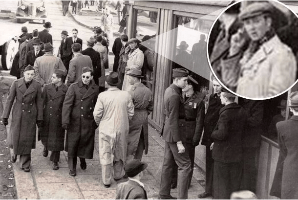 Analyse rapprochée du geste de l'homme sur la photographie de 1943